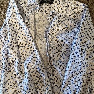 Louis Vuitton kids shirt size 5. Barely worn.